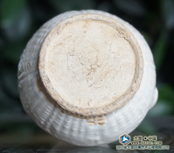 宋代白釉压花瓜棱小执壶