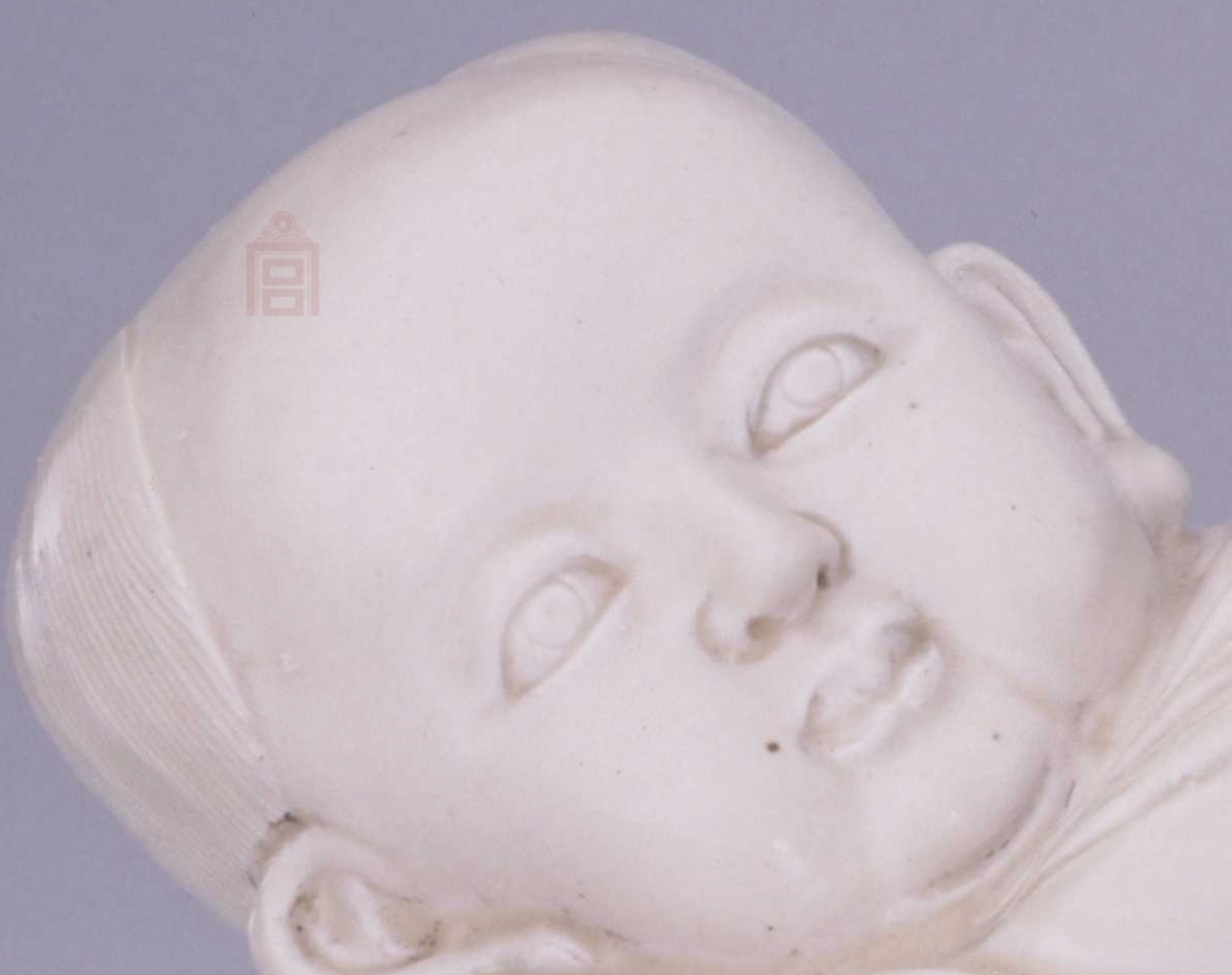 02 宋代 定窑白釉孩儿枕_3.jpg